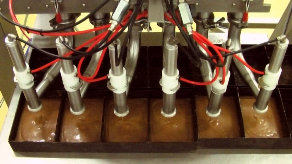 Decumpler Machine Depositors Fillers and Food Process Equipment Solutions
